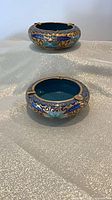Both cloisonné ashtrays front view