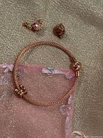 Bracelet, charm on bracelet, two loose charms