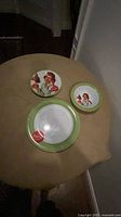 Dinner plate, salad plate and bowl showing pattern and rim color