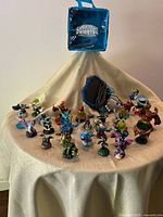 Group view of carrying case, portal board and all figurines displayed