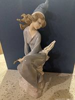 Front view of Lladro Star Gazing figurine showing overall design