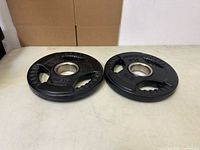 Both 5 lb Olympic plates front view