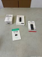 All four packaged items laid out on table