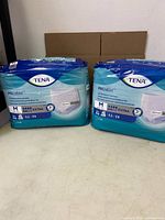 Two packs Tena ProSkin underwear front view