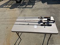 All three rod and reel combinations on table