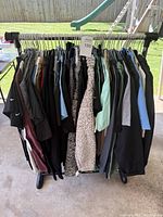 Full view of the garment rack with all shirts displayed