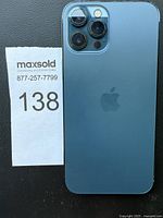 Rear of blue iPhone with triple cameras and LiDAR