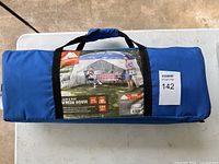 Full view of carry bag with product label visible