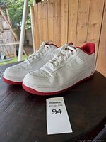 Full view of pair of Nike Air Force 1 Low sneakers