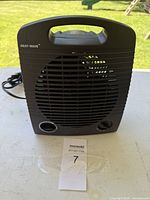 Front view of Heat-Wave EB1900 heater showing grille and controls