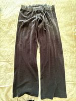 Juicy Couture black velour pants front view