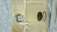 Irish linen napkins with T. Eaton Co. Superba labels and ribbon