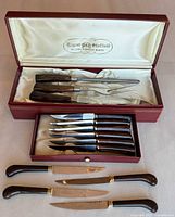 Open cases showing carving set and steak knives