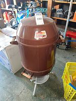 Full view of Coleman Outdoorsman Cookin' Machine grill smoker