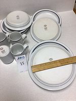 Items inverted showing maker’s marks and quantities