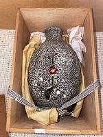 Vase in wood box with cloth wrap