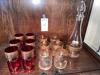 Group shot of all 13 glassware pieces on shelf