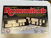 Rummikub box lid showing title and artwork