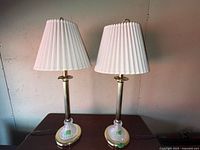 Front view of both lamps showing shades, columns, and bases