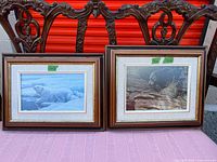 Both framed prints side by side