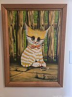 Full view of framed cat painting showing subject, colours and frame detail