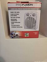 Box of ProFusion Heat 1500W fan-forced heater with thermostat