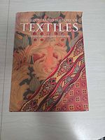 Front cover of The Illustrated History of Textiles