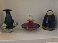 Front view of the three art glass pieces side by side