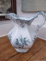 Full view of octagonal green floral transferware jug