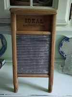 Front view showing full washboard, branding, zinc ribs and wooden frame