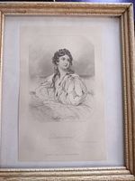 Front view of framed antique print showing image, title, mat and frame