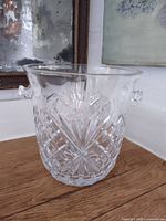 Clear cut glass ice bucket showing full shape and pattern
