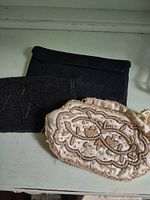 All three evening bags side by side