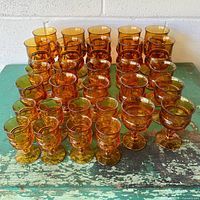 All 30 amber goblets grouped front view