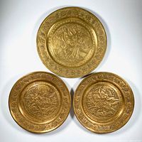 All three brass plates front view