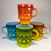 All four Kimberly mugs stacked showing colors and diamond pattern