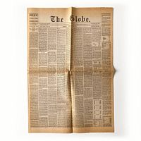 Full front page of folded newspaper showing masthead and articles