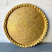 Full view of brass tray front