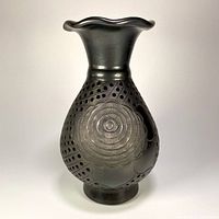 Full view of black barro negro vase showing shape and finish