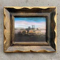 Front view of framed coloured pencil riverboat drawing