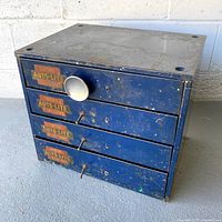 Front view showing 4 drawers and Auto-Lite decals