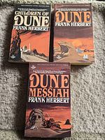 Front covers of all three paperbacks: Children of Dune, Dune, Dune Messiah