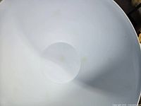 Interior of white plastic bowl