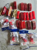 All lights laid out showing sealed packages and loose lenses