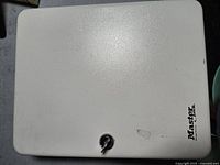 Front of Master Lock cabinet showing keyed lock