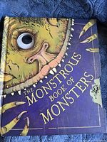 Front cover showing title and monster eye design