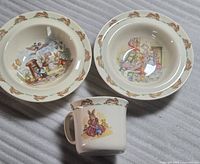 Overall view of two saucers and cup