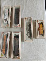 All six Bachmann HO scale boxed items laid out