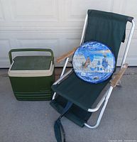 Overall lot showing lounge chair, Igloo cooler, Rest 'N' Go pack