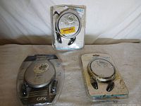 All three sealed GPX CD players in original packaging